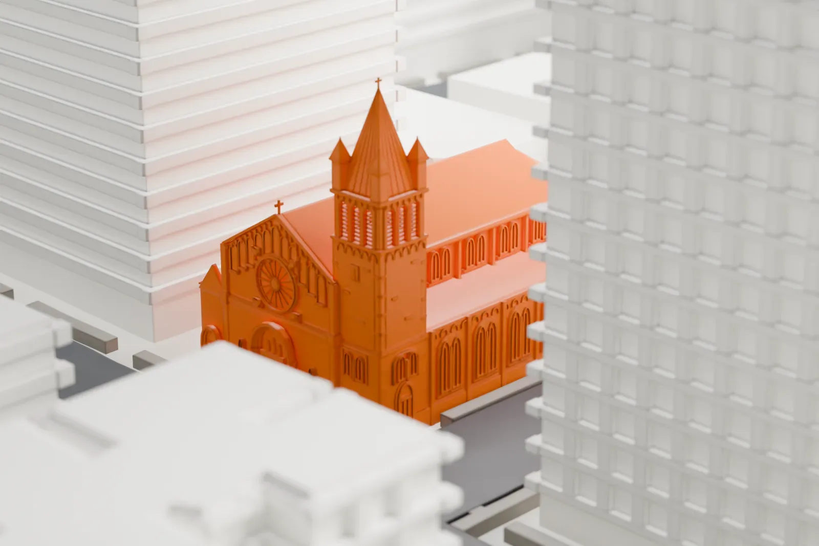 A white 3D print of the Church of St. John Nepomucene, a church with a tall pointed tower, tucked between much taller city buildings.