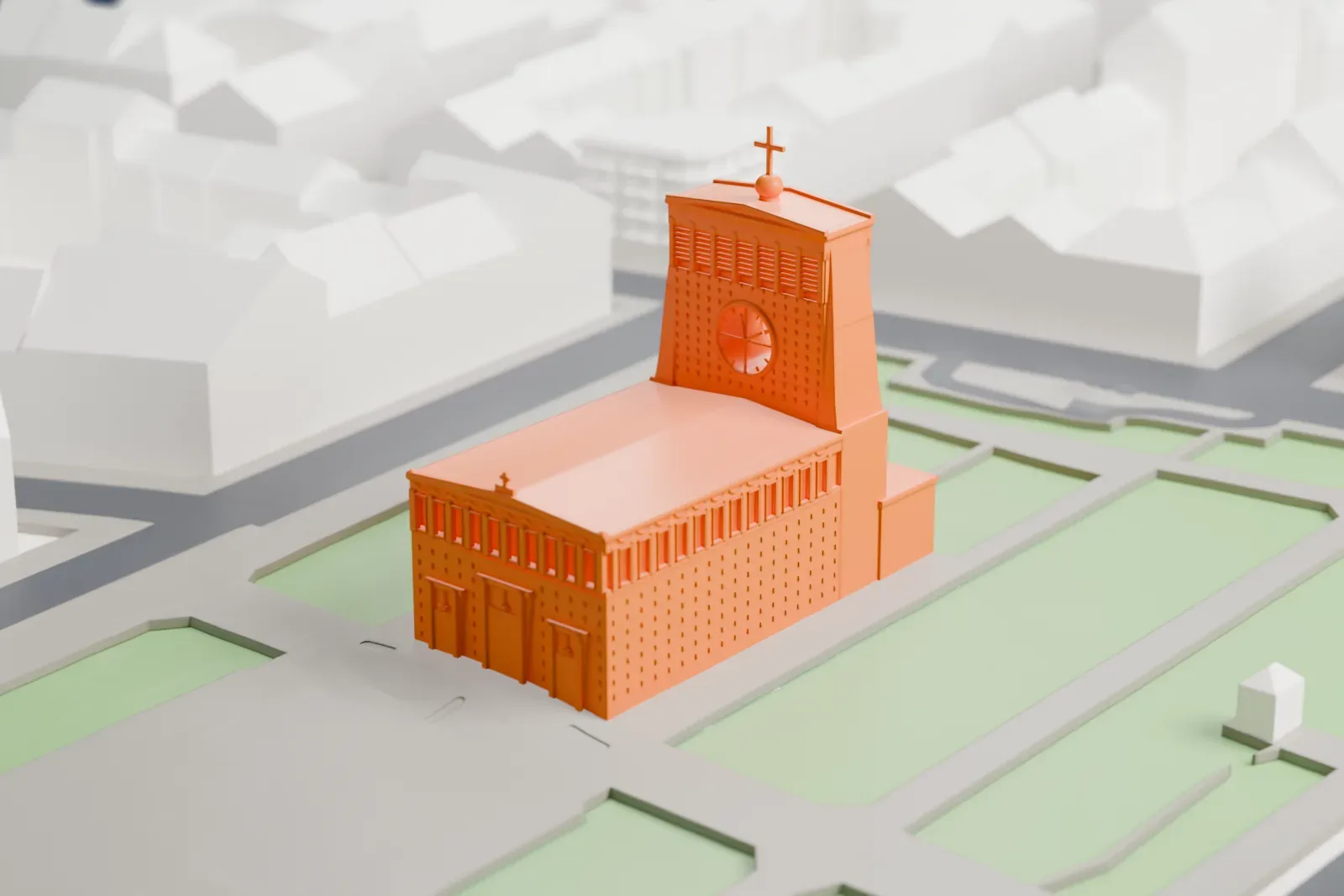 A white 3D print of the Church of the Most Sacred Heart of Our Lord in Prague, with the surrounding streets and buildings around it.