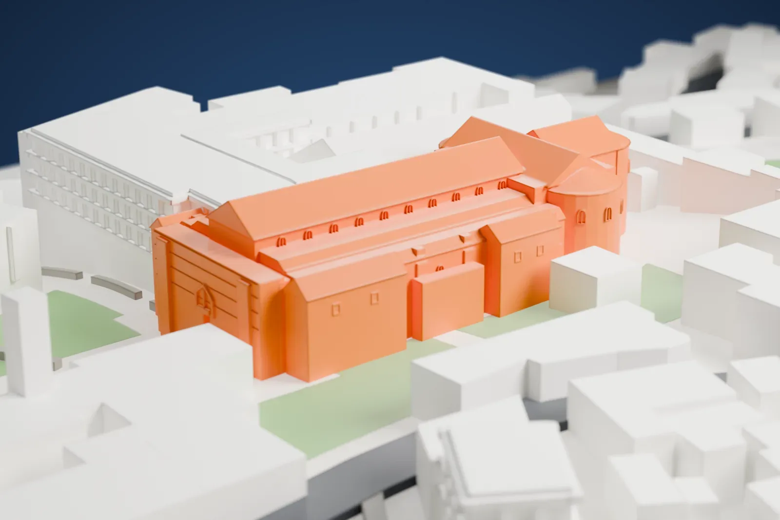 A white 3D print of the Church of the Nativity, a long pitched-roof church with rounded apses at one end, hemmed in by dense blocks of buildings.