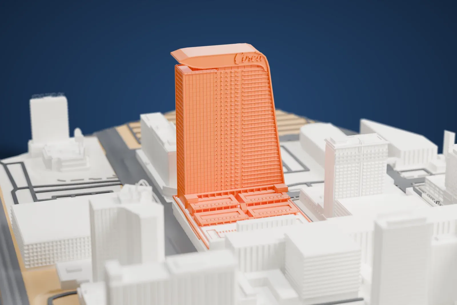 A white 3D print of Circa Resort & Casino, a tall tower with a curved cap above a low terraced podium, among gray city blocks and streets.