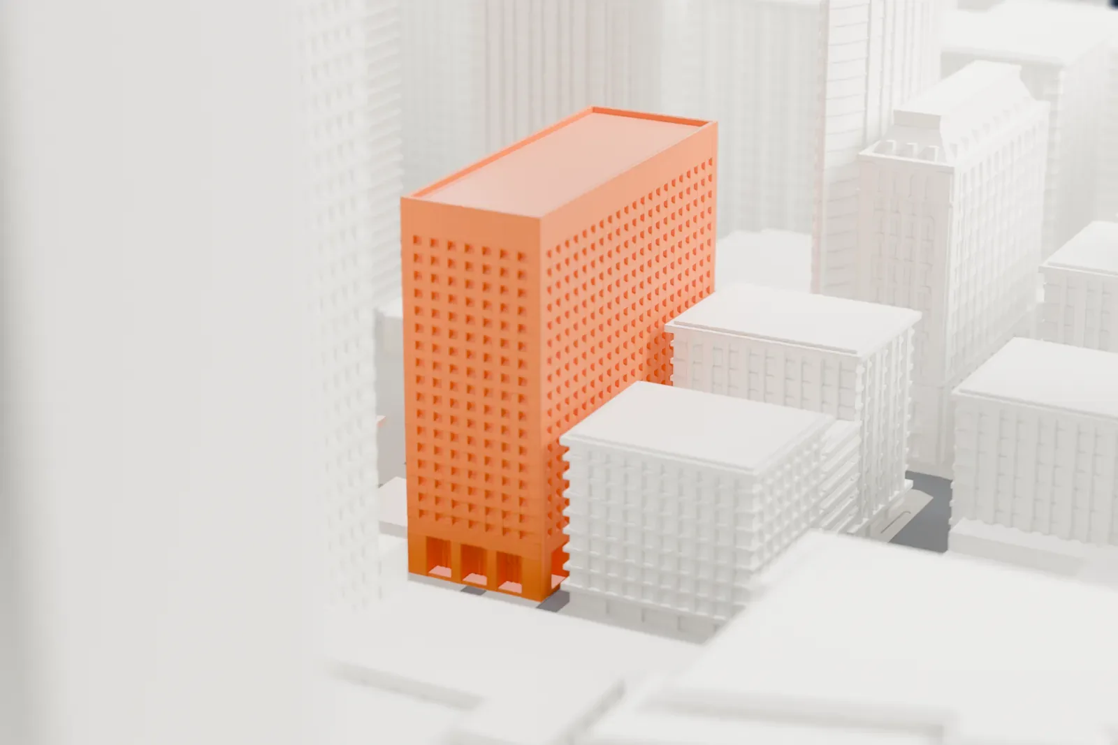 A white 3D print of Commerce Court, a group of buildings of different heights among the surrounding streets and buildings.