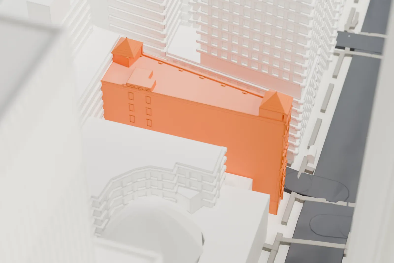 A white 3D print of the Corbin Building, a long, narrow building with pyramid-roofed ends, hemmed in by tall Financial District towers.