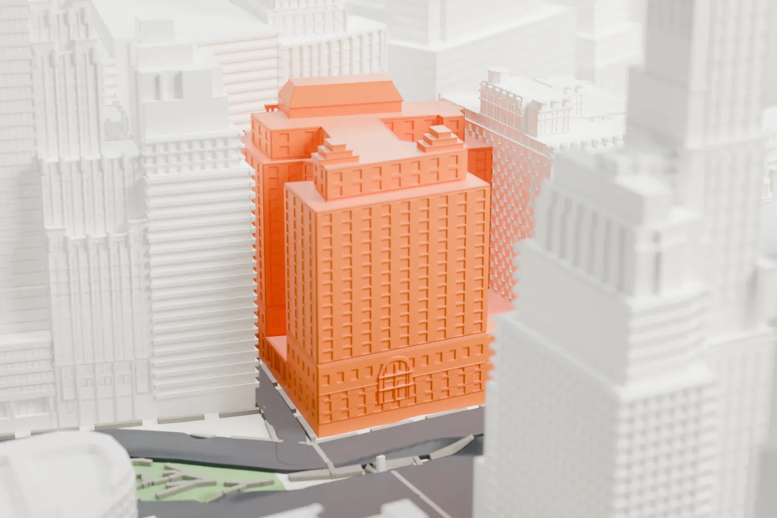A white 3D print of the Cunard Building, a tall stepped office block with setbacks near its top, surrounded by dense Lower Manhattan towers.