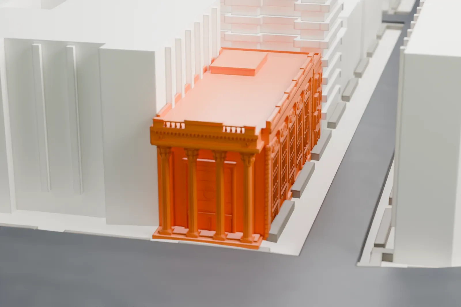 A white 3D print of the Daryl Roth Theatre, a low corner building with a columned front and a decorated cornice, between much taller buildings.
