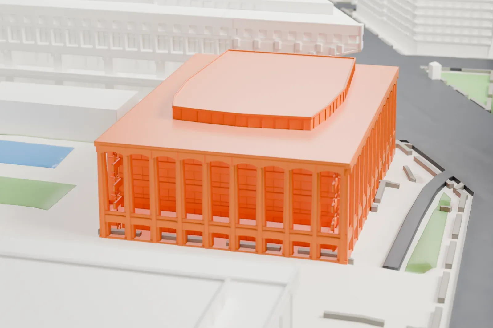 A white 3D print of David Geffen Hall, a wide building with a tall colonnade and a curved raised roof section, beside open plazas and streets.