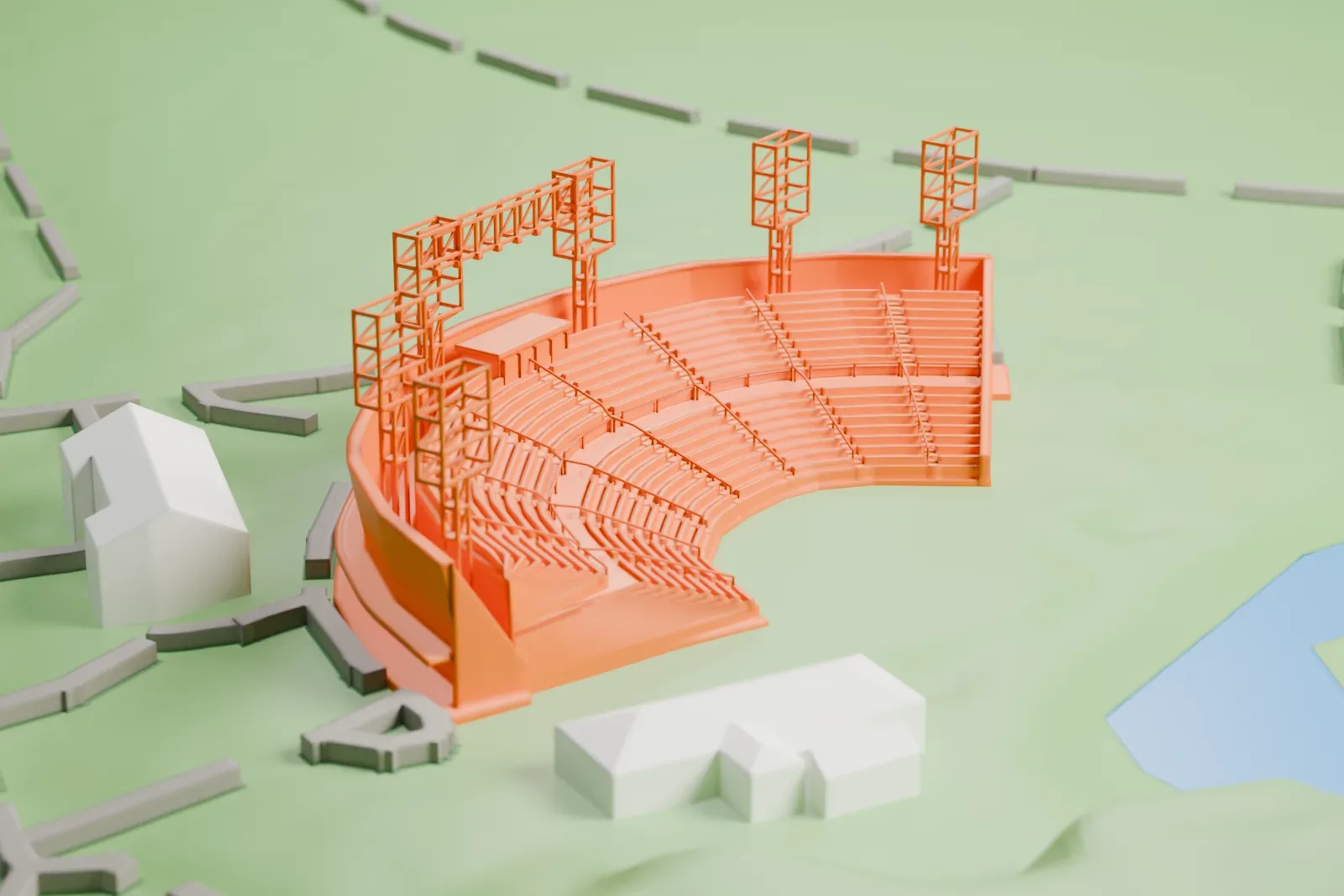 A white 3D print of the Delacorte Theater, a curved open-air amphitheater with tiered seating and tall lattice lighting towers, set in a park with winding paths and water.