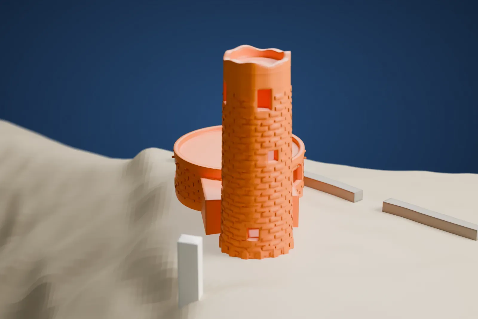 A white 3D print of Desert View Watchtower, a round stone tower beside a low round building with a flat roof, on sloping ground.