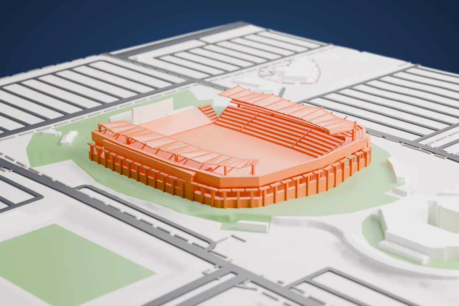 A white 3D print of the soccer stadium at Dignity Health Sports Park, its tiered stands around the pitch, with grass around it, roads on every side and another stadium building nearby.