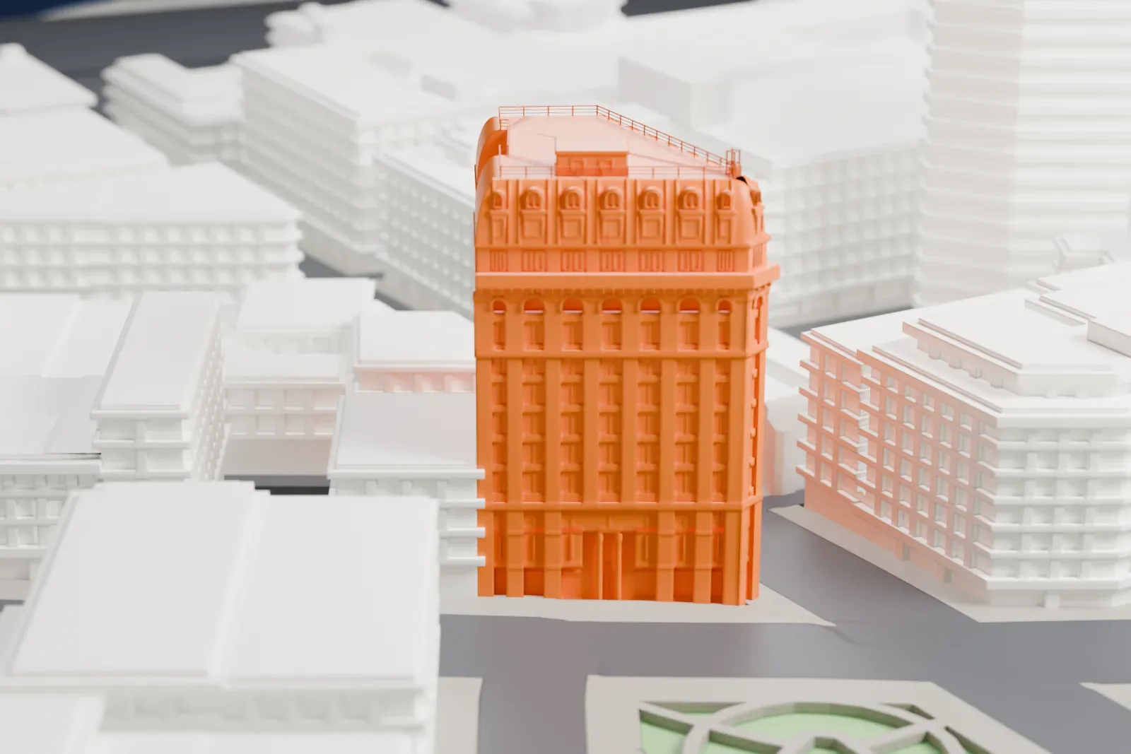 A white 3D print of the Dominion Building among the surrounding streets and buildings of downtown Vancouver.