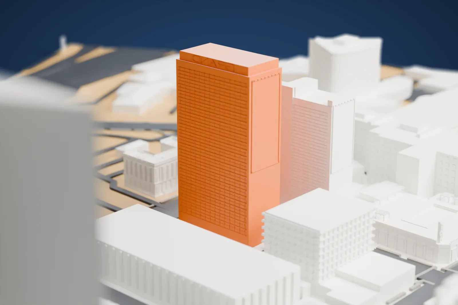 A white 3D print of the Downtown Grand, a cluster of tall towers with lettering at the top of the tallest one and a long lower wing, among surrounding city blocks.