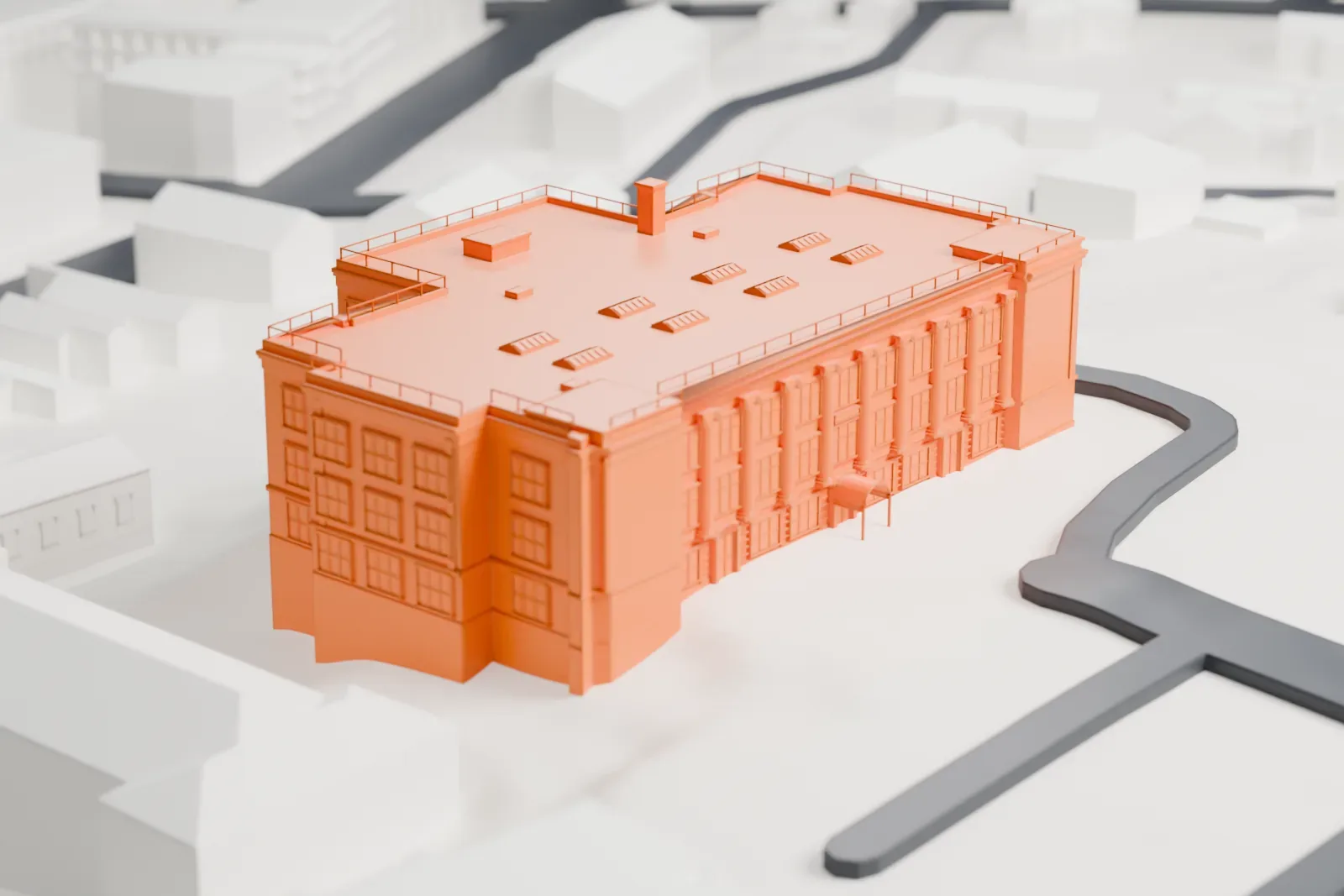 A white 3D print of a large school building with a flat roof and rows of windows, among nearby houses and streets.