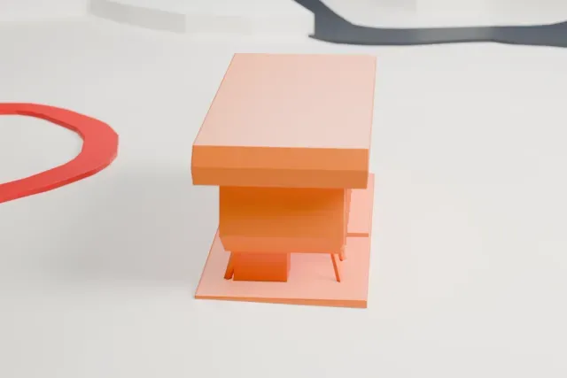 A white 3D print of the Dubai Autodrome Marketing and Management Building model in Dubai, with the streets around it.