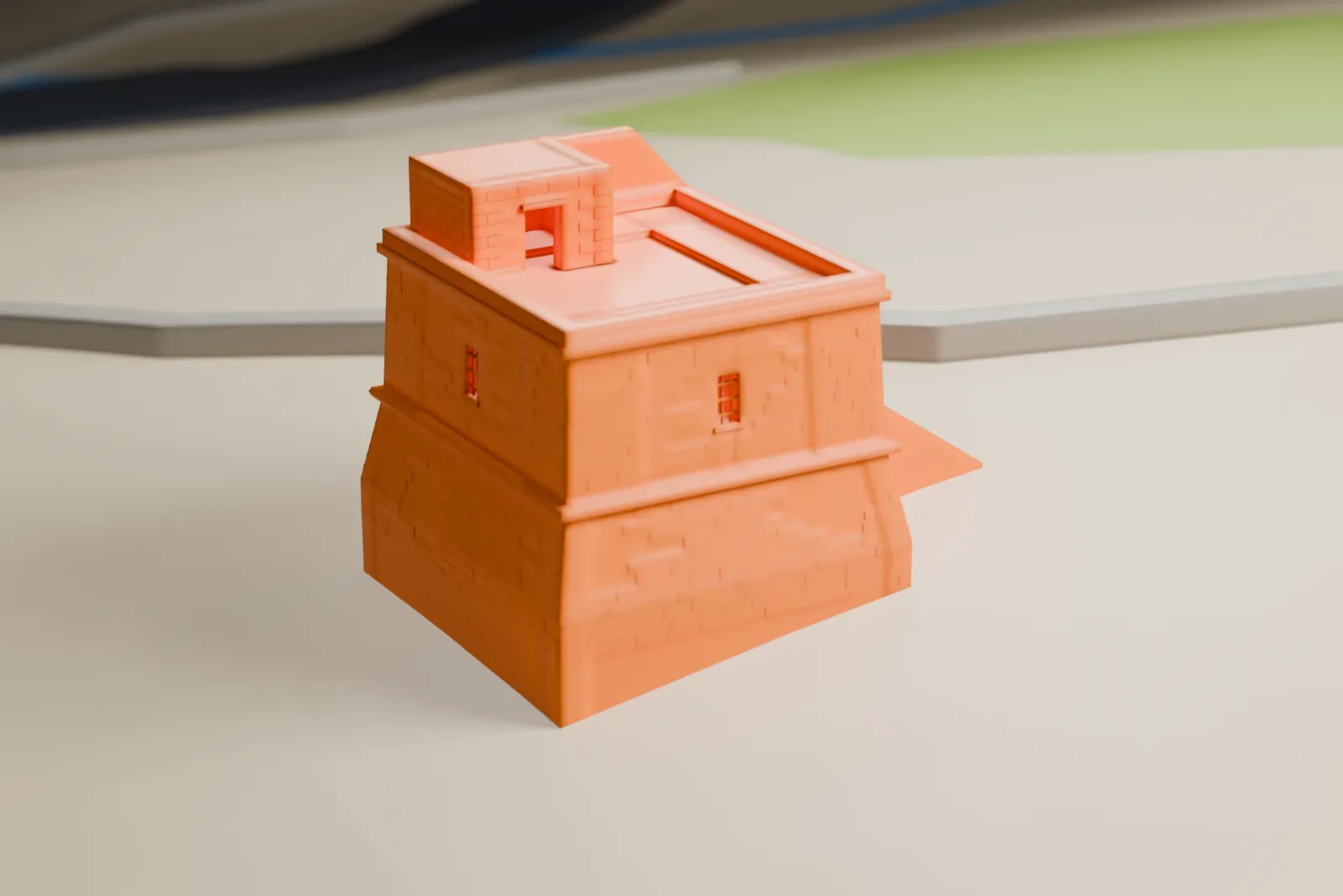 A white 3D print of Dwejra Tower, a small square watchtower with a sloped base and a stair up to its door, standing on open ground.