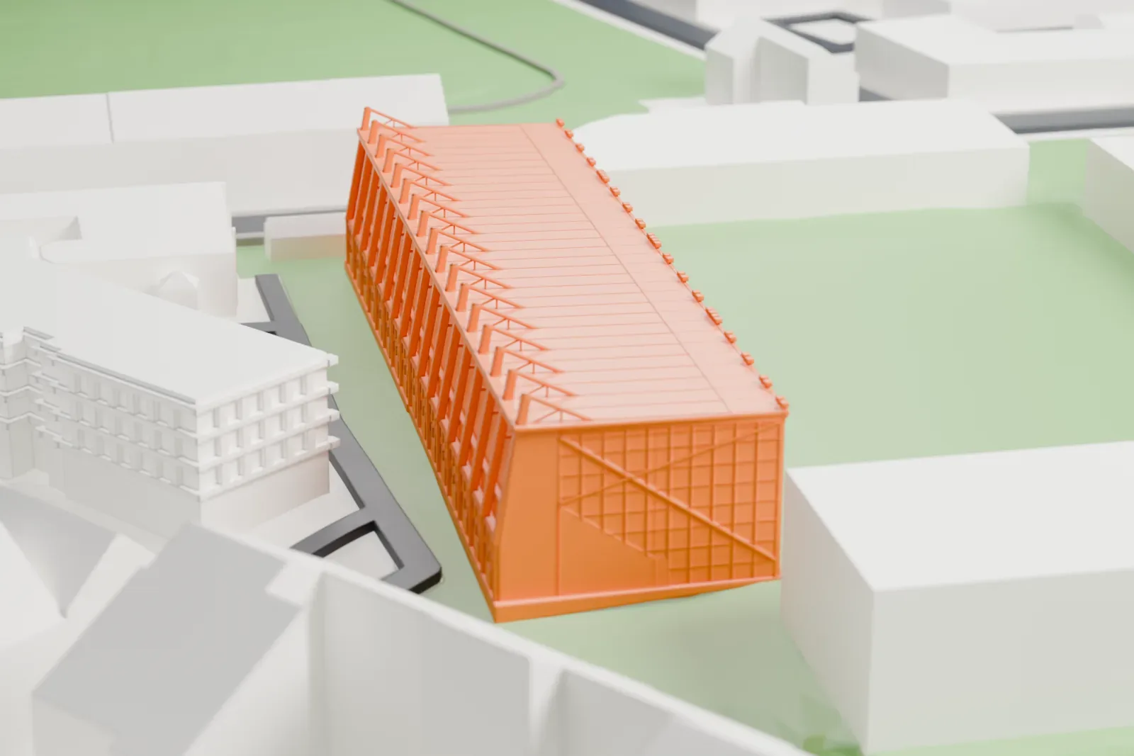 A white 3D print of Easter Road's West Stand, a long stand with a shallow roof and two seating decks, among surrounding streets and buildings.