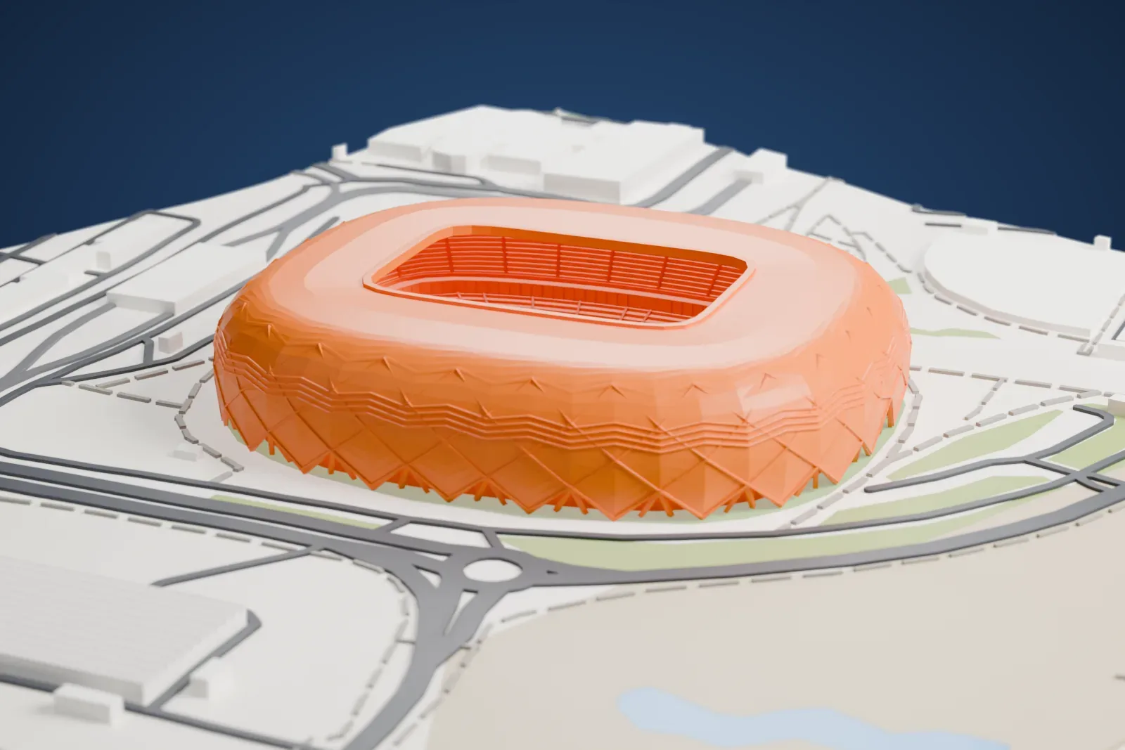 A white 3D print of Education City Stadium, a cushion-shaped arena with a diamond lattice over its skin and a dark domed roof ring, among the surrounding city.