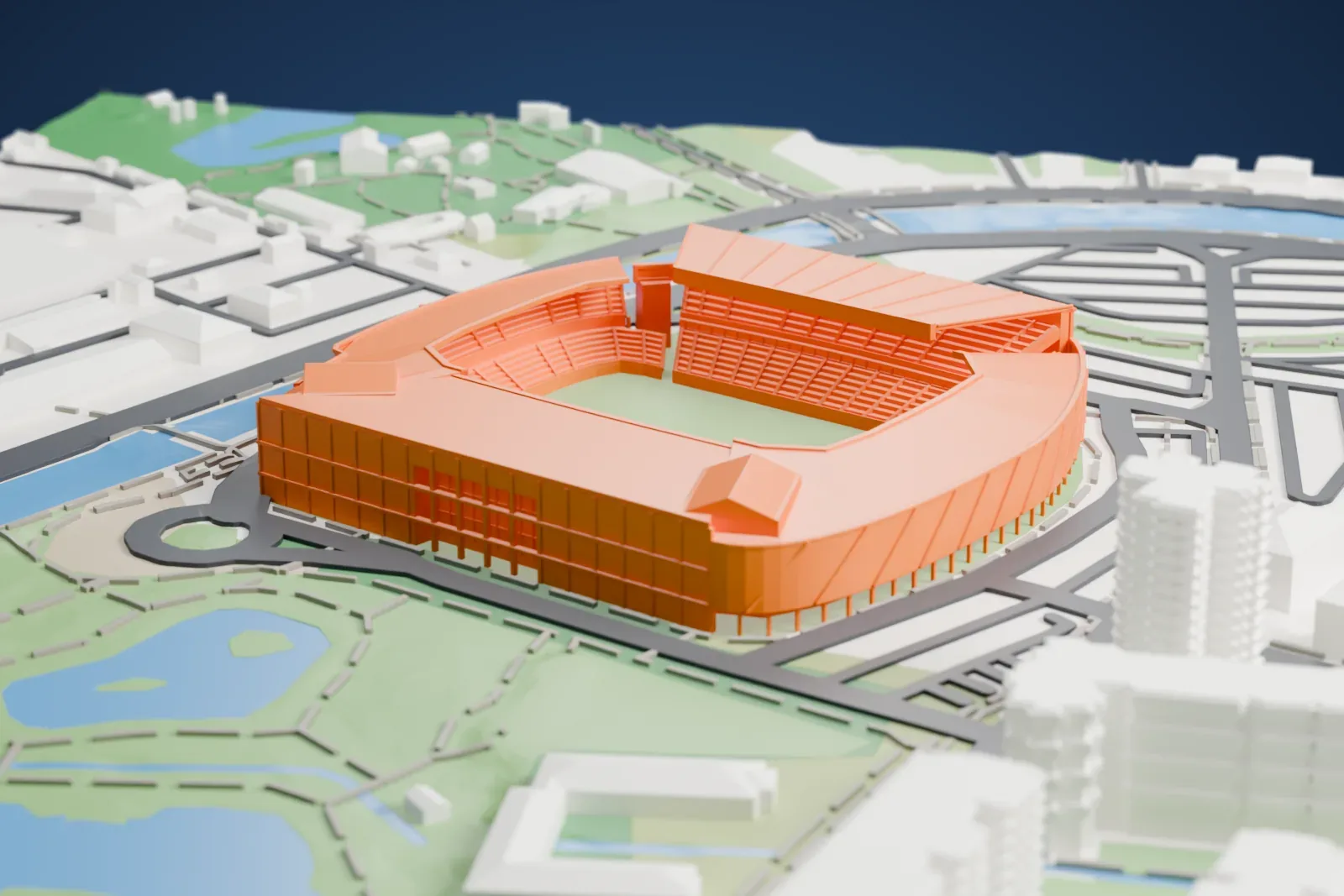 A white 3D print of El Molinón, four roofed stands of different heights enclosing a pitch, with one stand clearly taller than the rest, among the surrounding city.