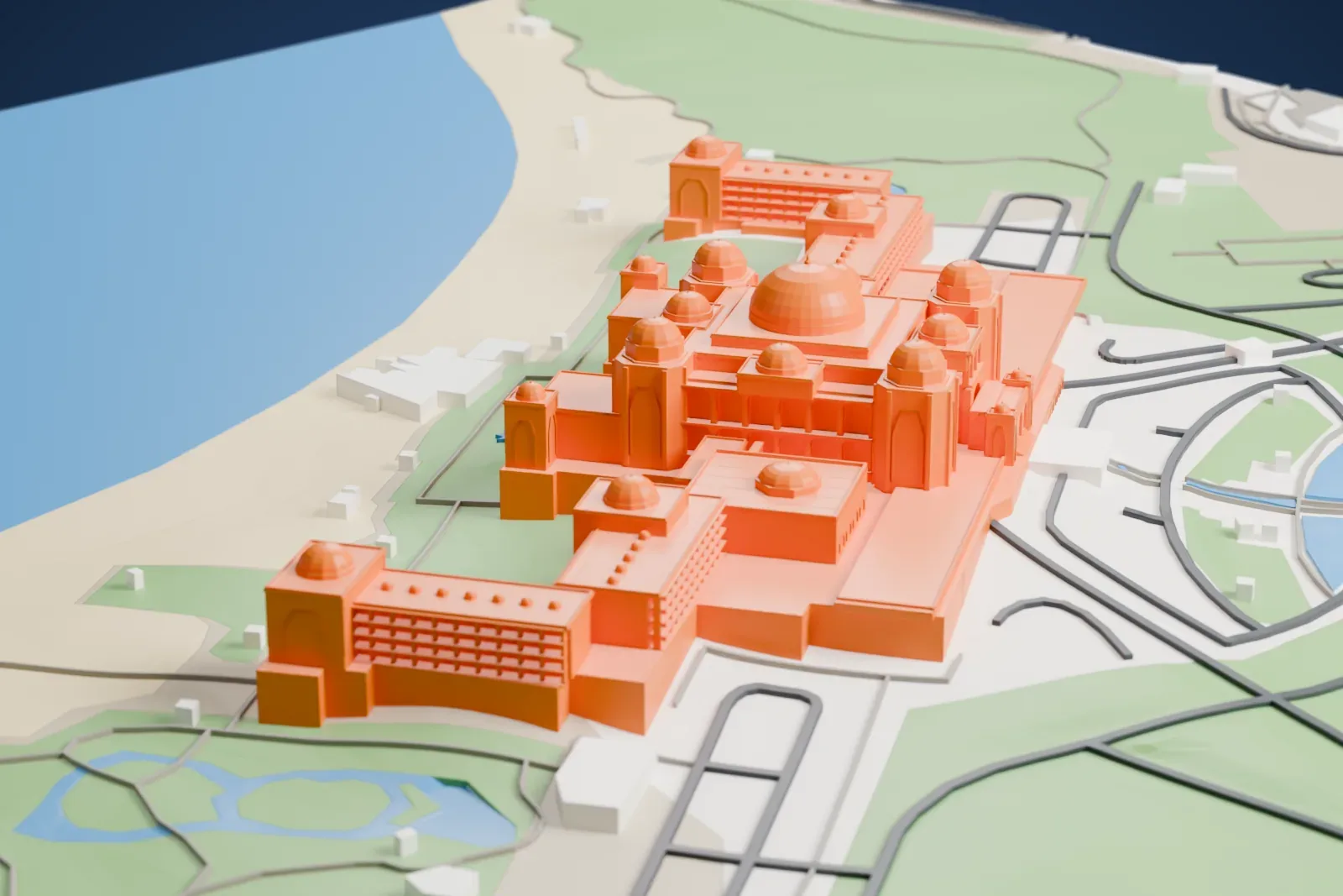 A white 3D print of the Emirates Palace, showing its large central dome, many small cupolas, low wings and the city blocks around it.