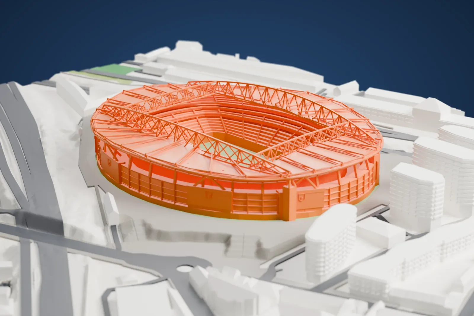 A white 3D print of the Emirates Stadium, a large football stadium, among the surrounding streets and buildings.