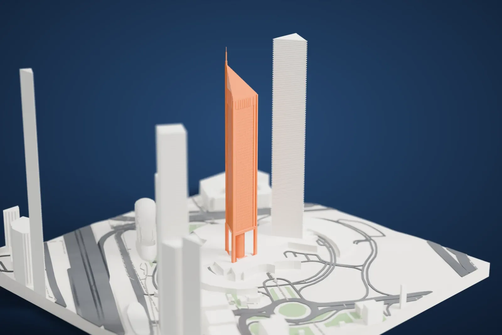 A white 3D print of the Emirates Office Tower, a tall triangular tower with a pointed top and thin spire, standing on a landscaped base beside neighboring towers and roads.