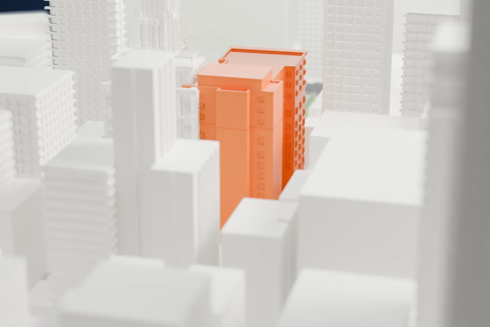 A white 3D print of the Engineers' Club Building, a tall ornate building at the edge of a green park, with taller buildings behind and beside it.
