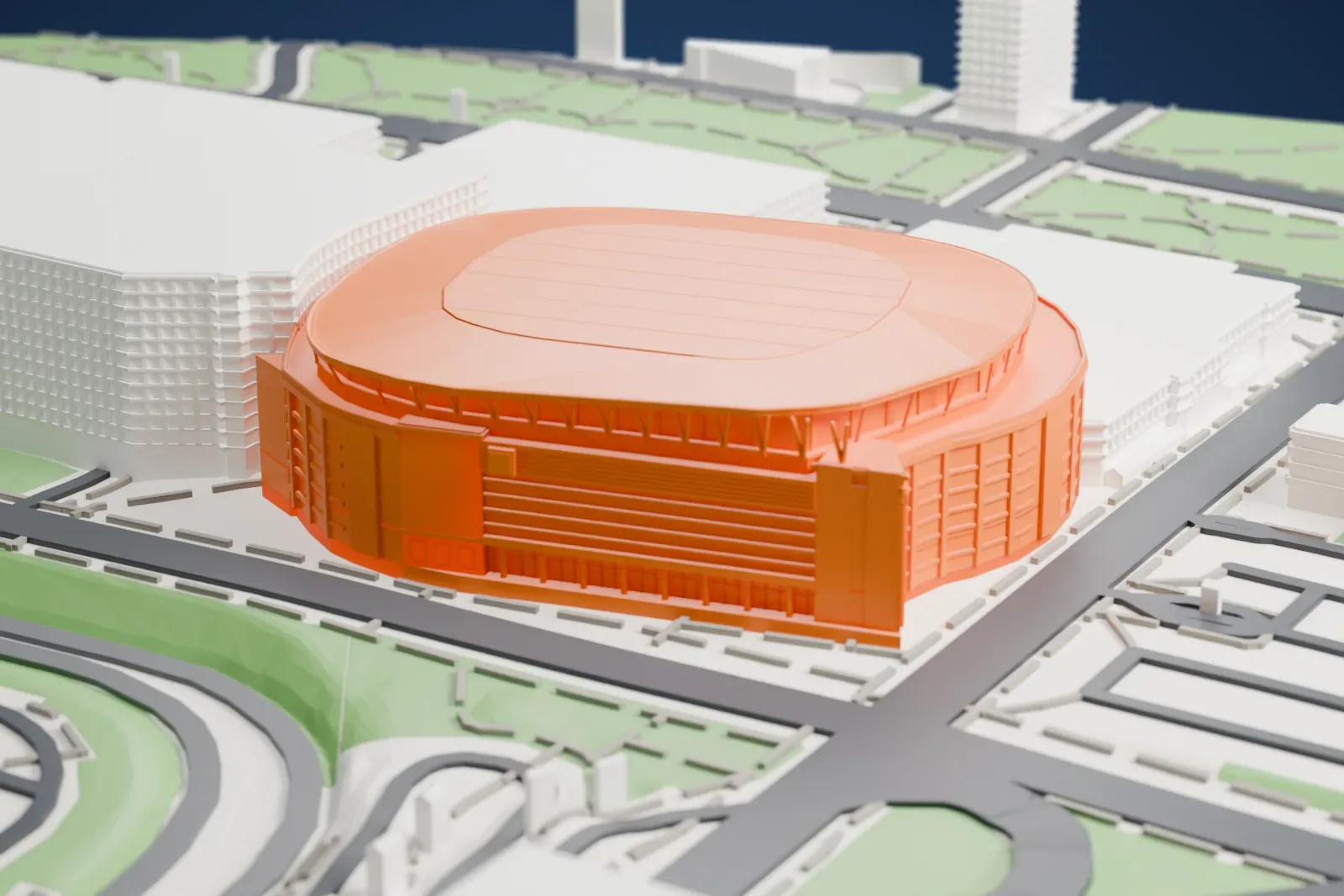 A white 3D print of Enterprise Center, a low arena with an oval roof and a banded glass front between stone end blocks, among surrounding city streets and buildings.