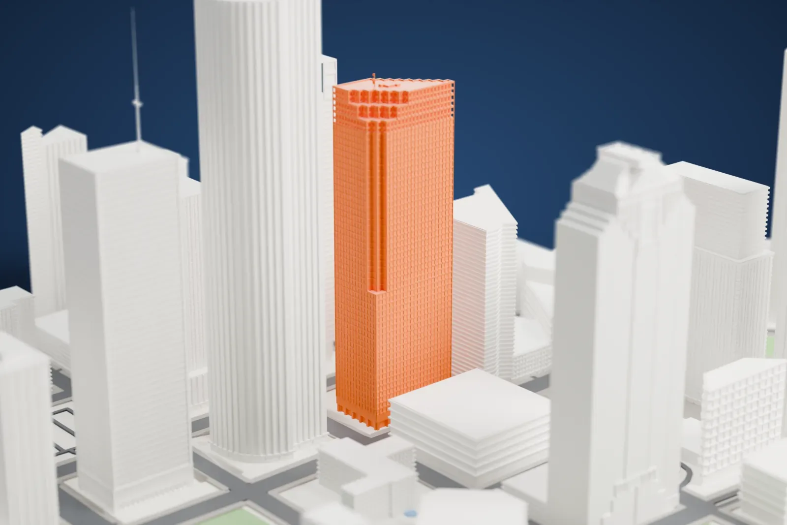 A white 3D print of Enterprise Plaza with the surrounding streets and buildings.