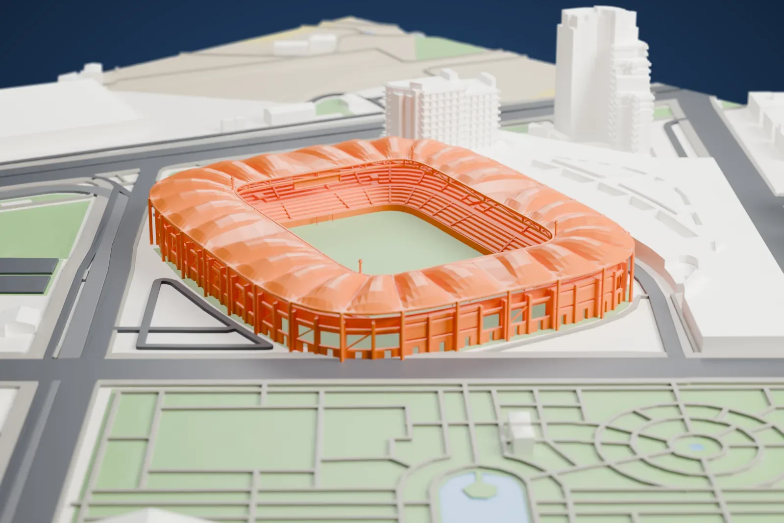 A white 3D print of the Estadi Ciutat de València, with its scalloped roof and open playing area among surrounding streets and buildings.