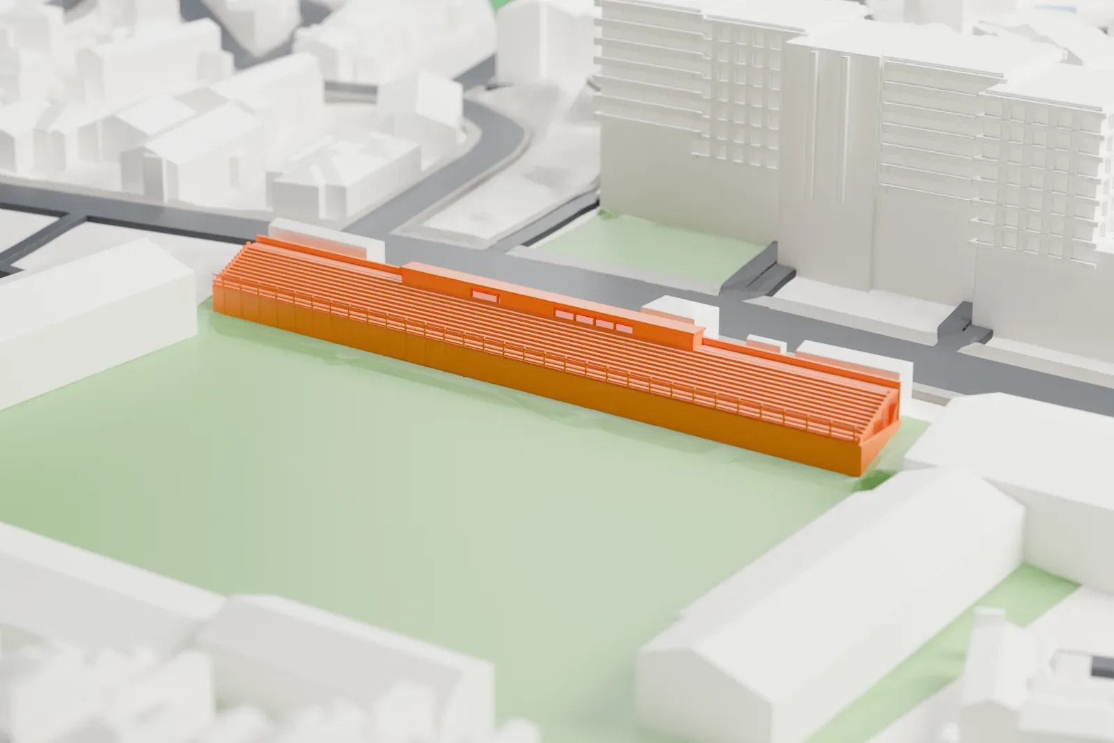 A white 3D print of Estádio António Coimbra da Mota, a long stepped terrace with a low rear booth beside the pitch, among surrounding buildings.