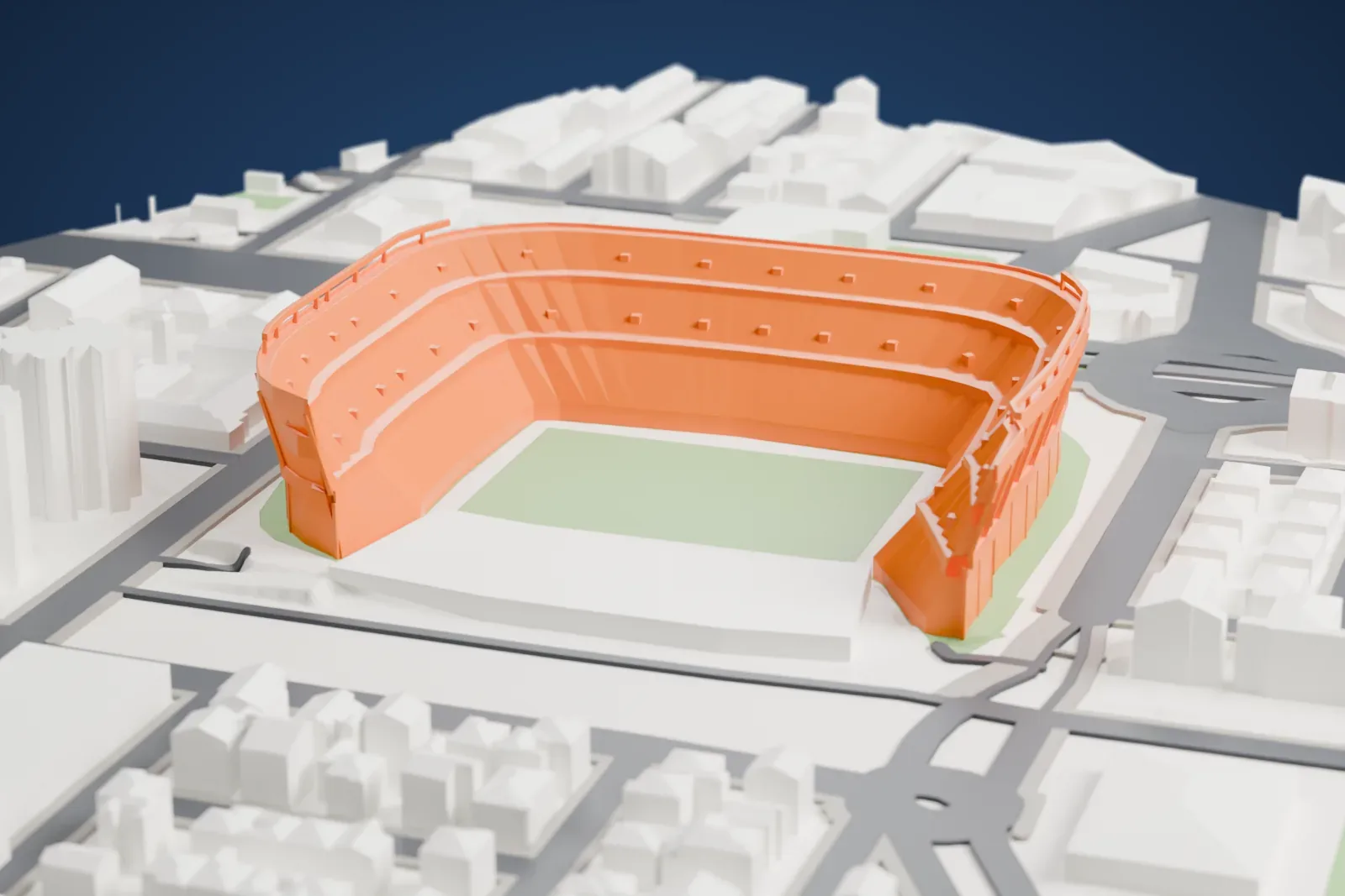 A white 3D print of the Estadio Benito Villamarín, a stadium of stepped stands around the pitch, standing among the surrounding buildings of Seville.