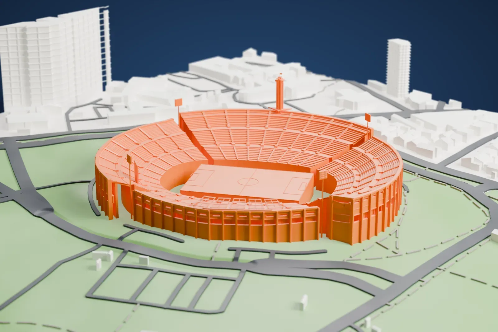 A white 3D print of Estadio Centenario, an open horseshoe-shaped football stadium with stepped stands and a tall tower at one end, set in green parkland with roads and low city blocks nearby.