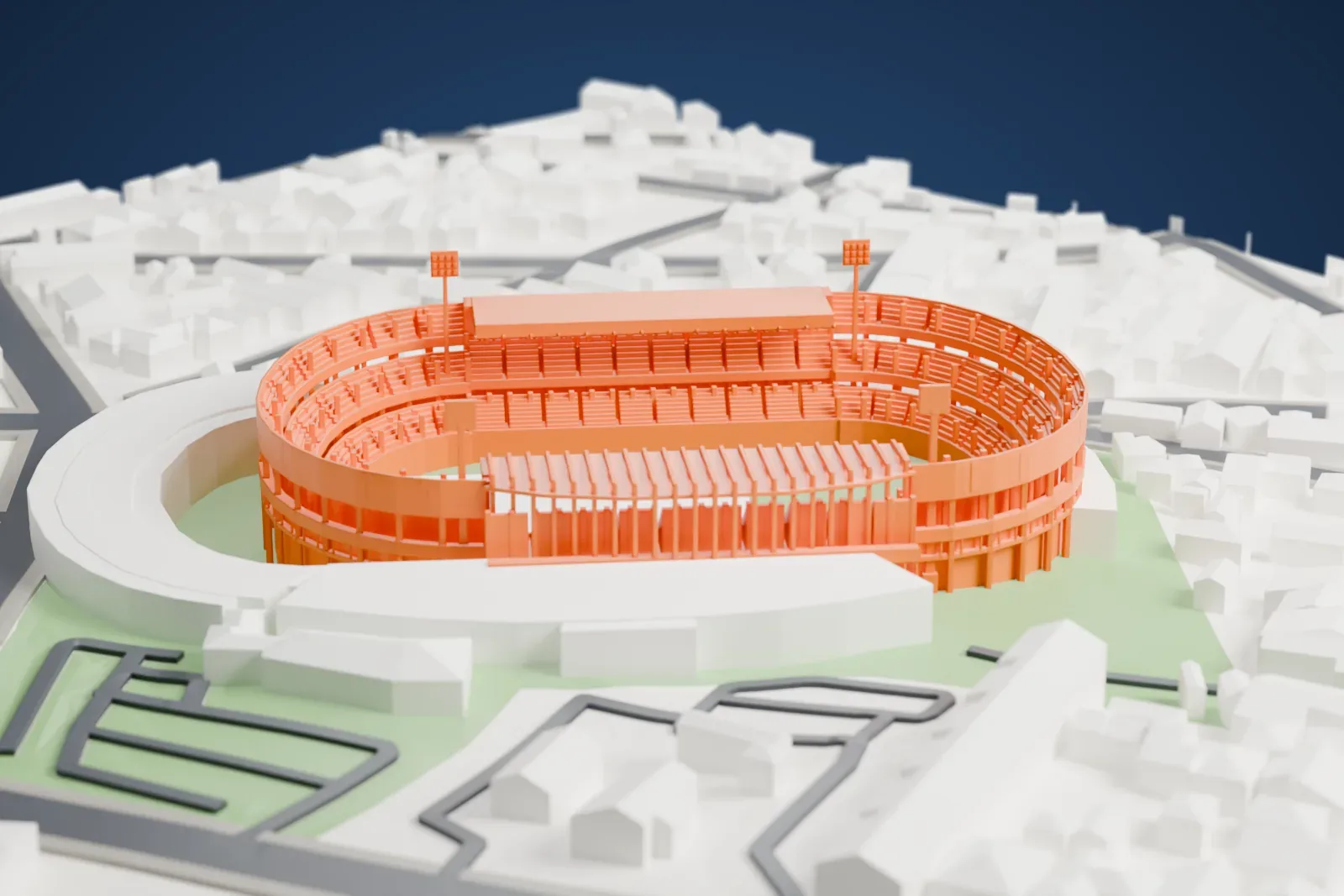A white 3D print of Estádio Couto Pereira, an open field ringed by tiered stands, with a roofed stand along one side, among surrounding streets and buildings.