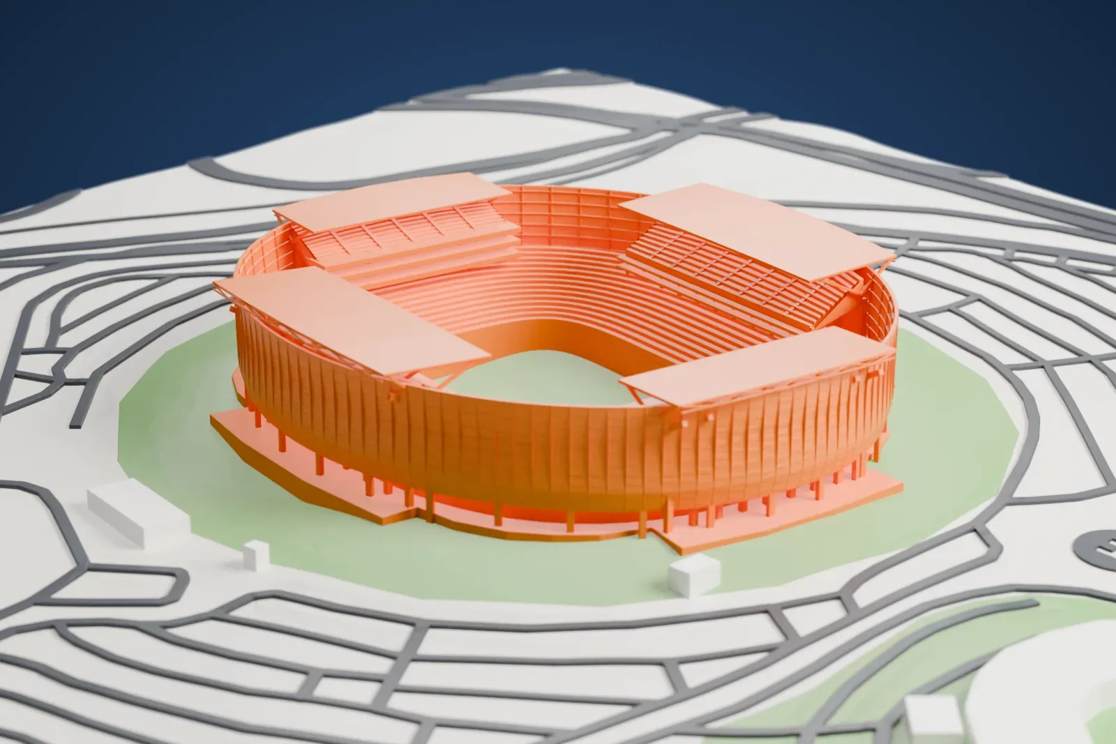 A white 3D print of Estadio Cuauhtémoc, a stadium with a tall curved screen and four separate roofs around an open pitch, among surrounding streets and buildings.