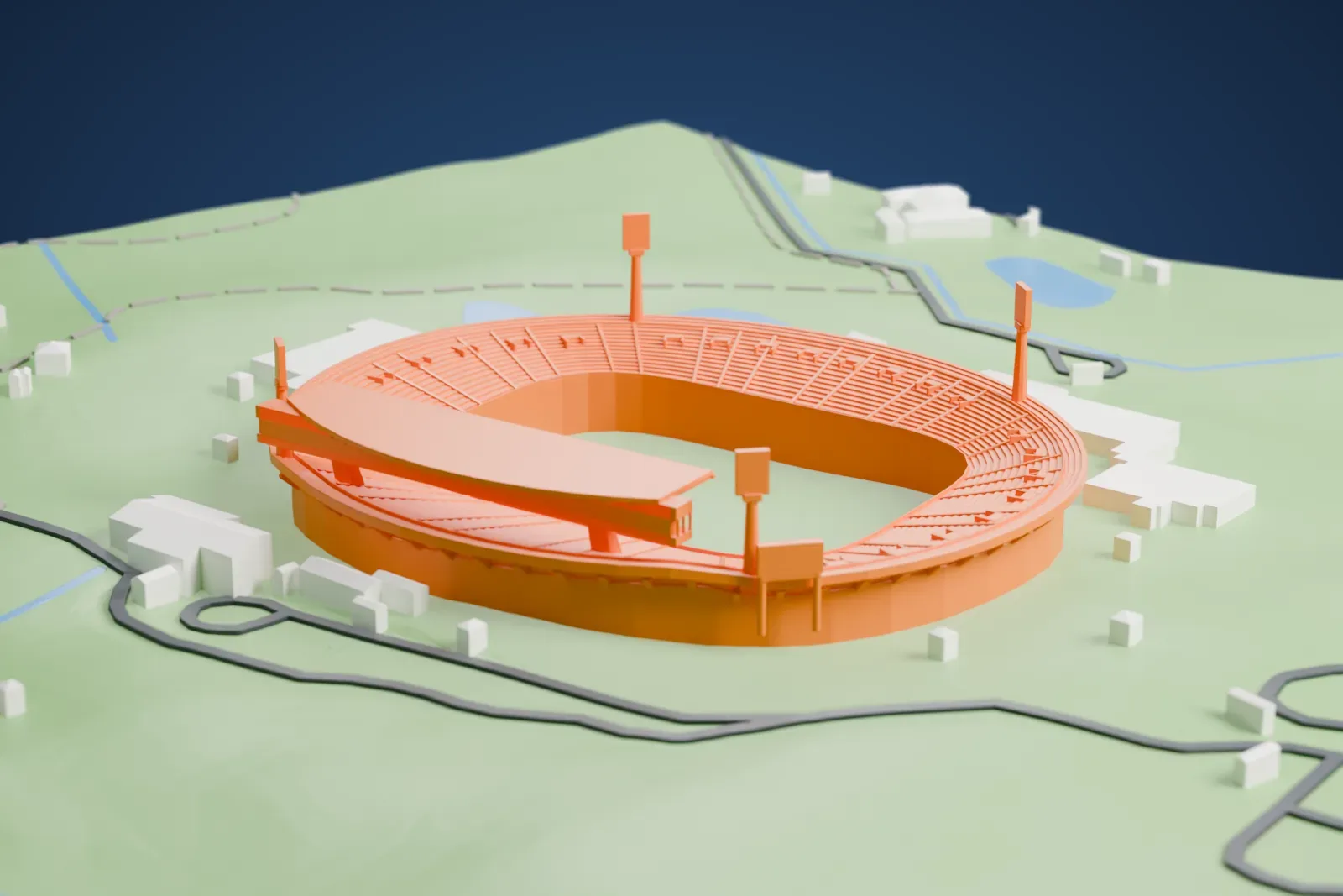A white 3D print of the Estadio Malvinas Argentinas, an oval bowl with a long roofed stand carried on two pylons and four tall corner light towers, on a base of surrounding streets and buildings.
