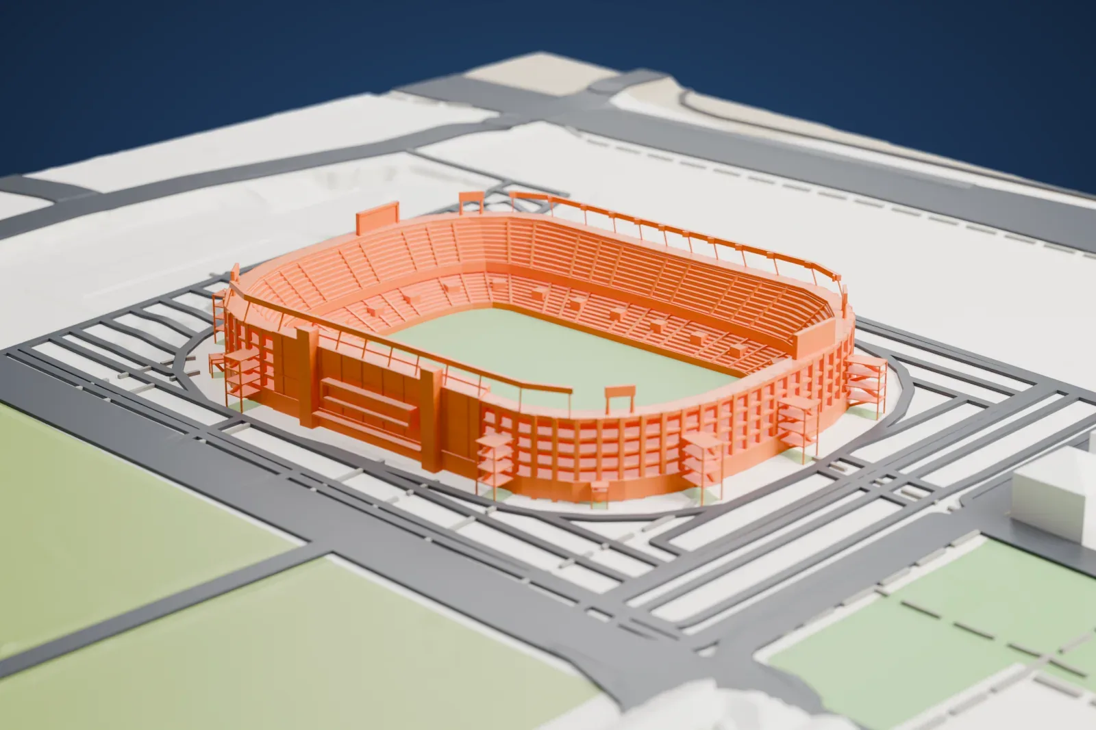 A white 3D print of the Estadio Martínez Valero, a closed two-tier bowl in an open concrete frame with external stair towers and light trusses over both sidelines, on a base of surrounding streets and buildings.