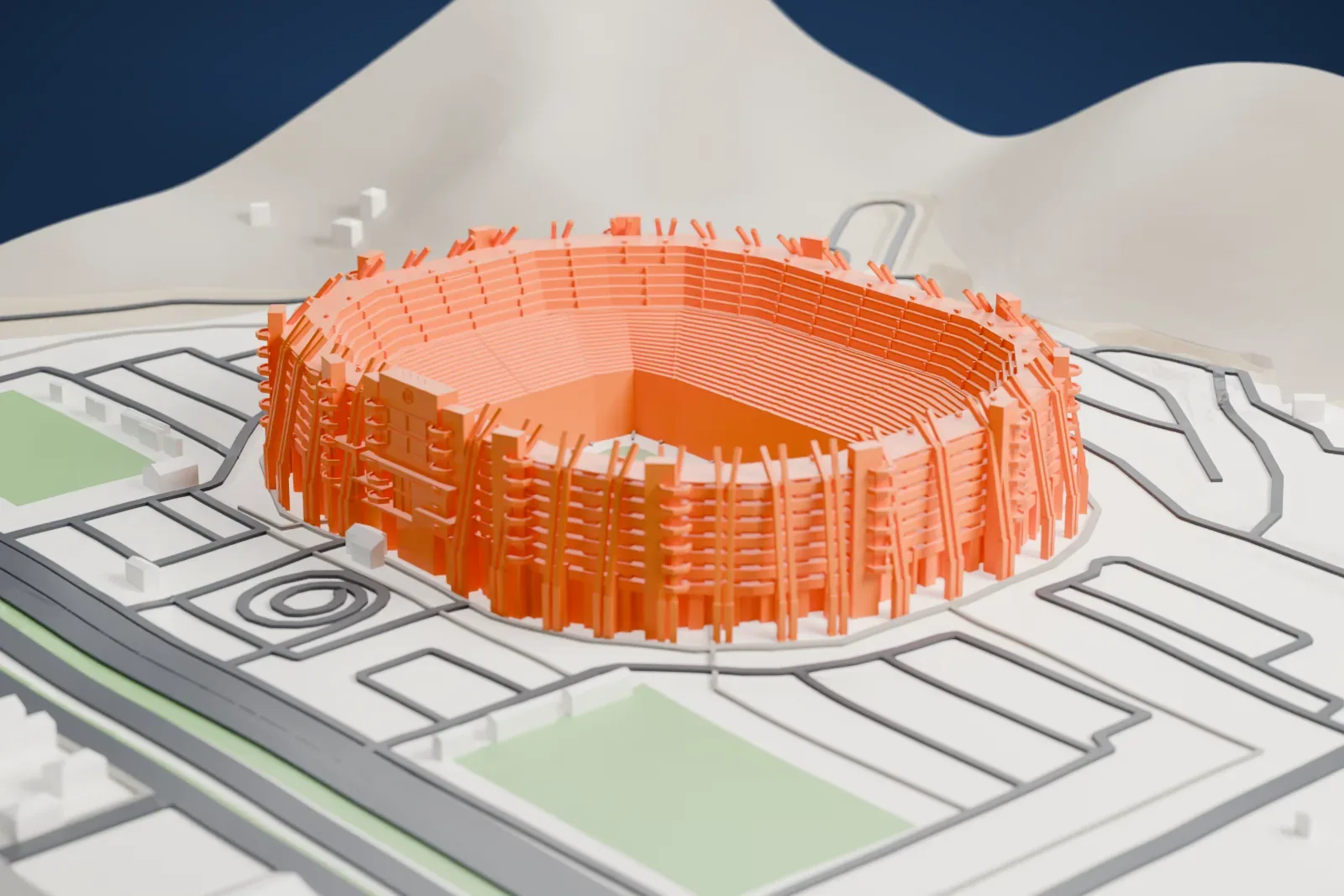 A white 3D print of Estadio Monumental "U", an open football bowl ringed by suites and forked exterior ribs, among surrounding streets and buildings.