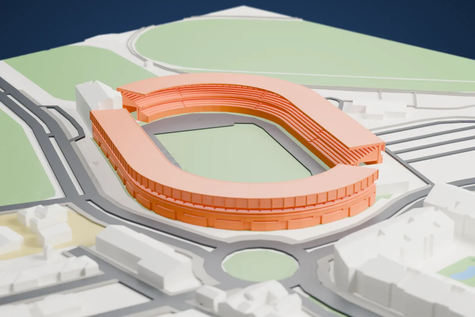 A white 3D print of Estadio Municipal de Chapín, a horseshoe-shaped stadium bowl, among surrounding roads and buildings.