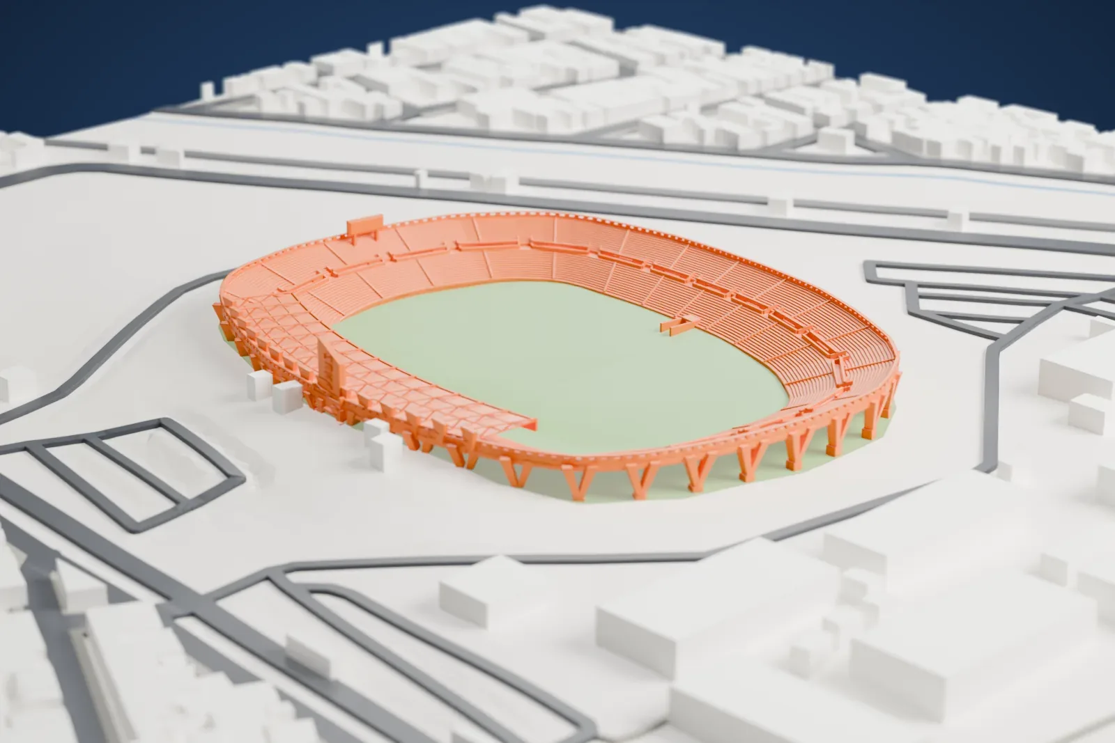 A white 3D print of Estadio Neza 86, an oval stadium with stepped stands on slanted support legs around a green pitch, among surrounding streets and buildings.