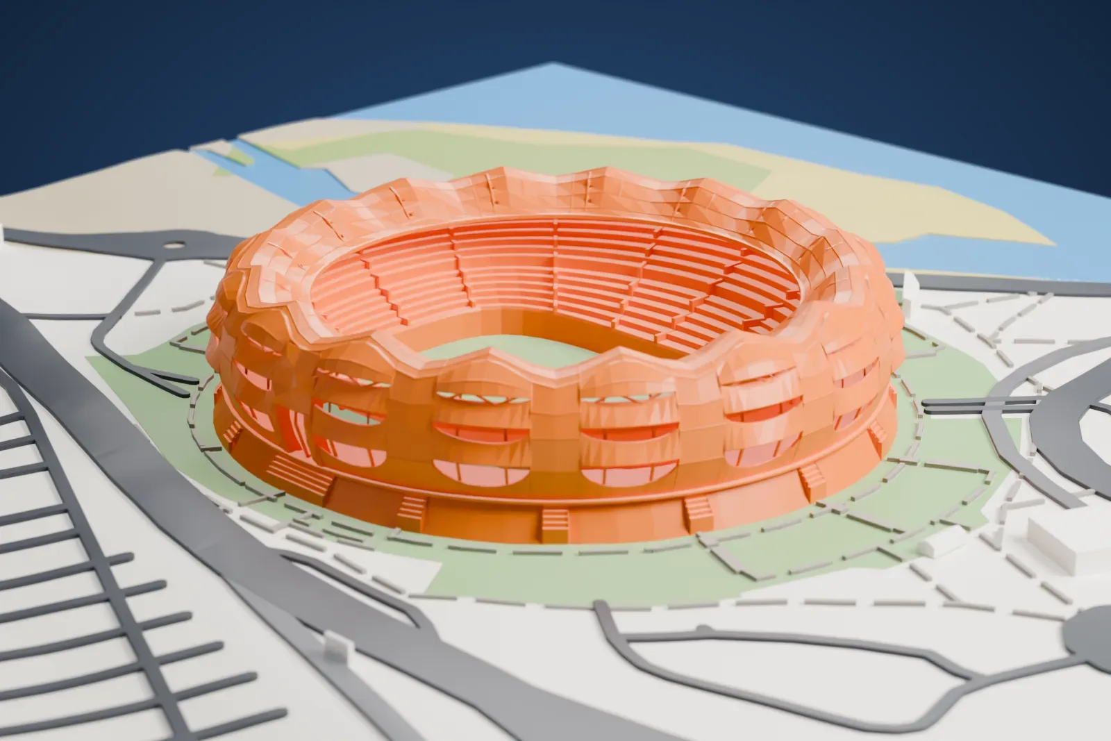 A white 3D print of Estadio Único Madre de Ciudades, a round stadium with a scalloped outer wall and stepped seating around an open pitch, with green ground, roads and water nearby.