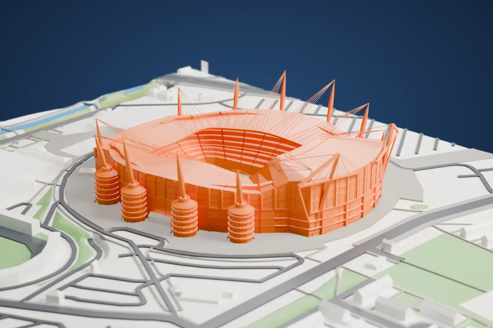 A white 3D print of the Etihad Stadium, a large football stadium, among the surrounding streets and buildings.