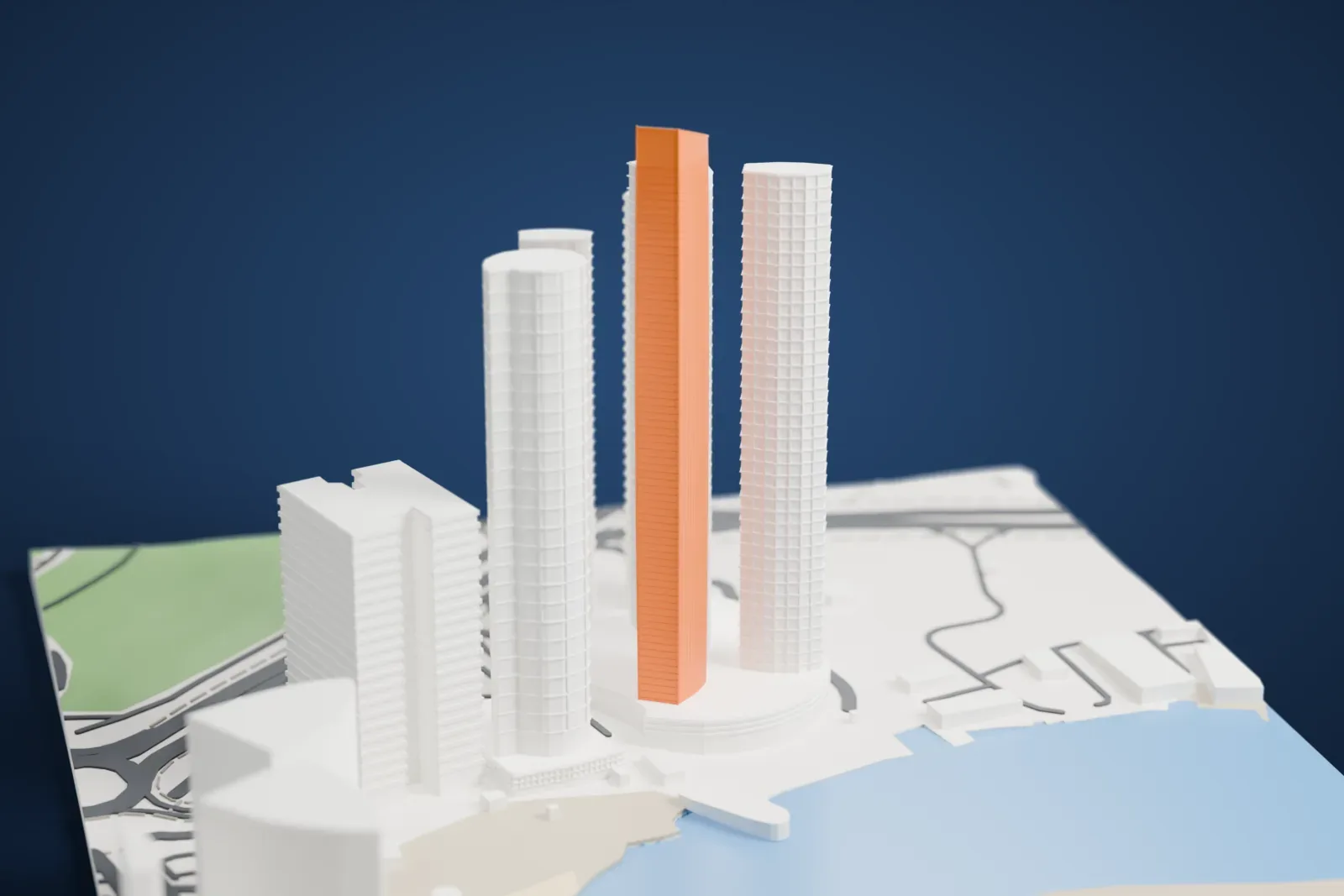 A white 3D print of the Etihad Tower 2 with a sloping roof, rising among nearby towers and roads beside the waterfront.