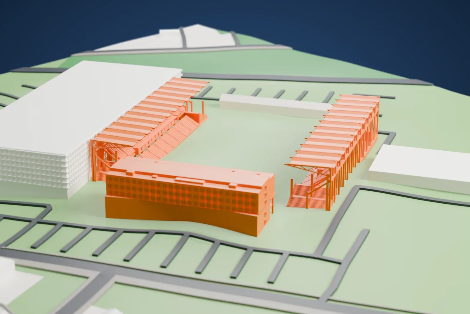 A white 3D print of ETO Park, with two covered grandstands around an open pitch and the hotel beside them, among surrounding buildings.