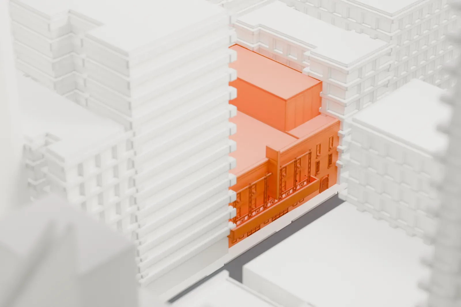 A white 3D print of the Eugene O'Neill Theatre, a small low block tucked between much taller buildings in dense Midtown streets.
