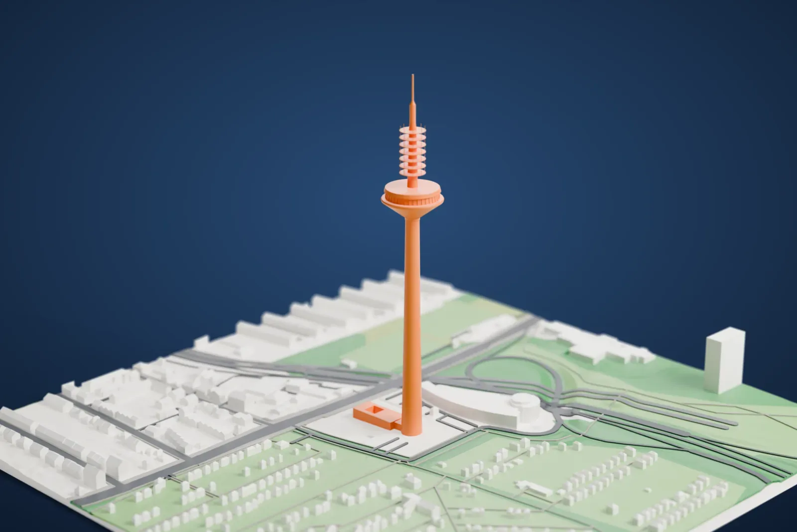 A white 3D print of the Europaturm, a tall slim tower with an antenna, rising above the surrounding streets and buildings of Frankfurt.