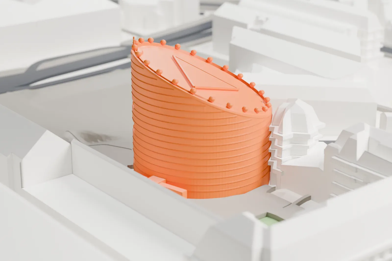 A white 3D print of Évry Cathedral, surrounded by streets and buildings.