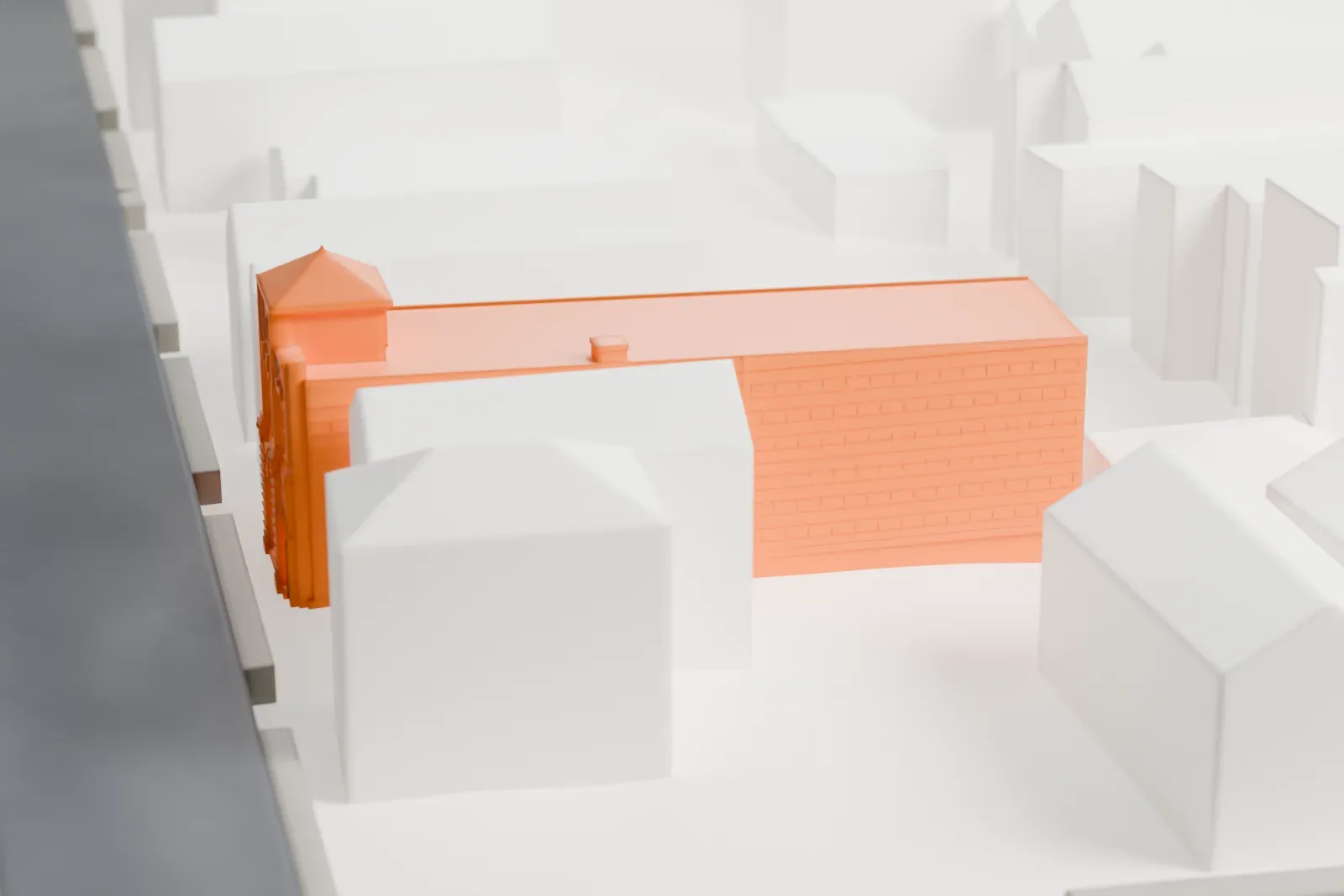 A white 3D print of the Excelsior Engine Co. No. 2 Firehouse, a long, narrow building with a decorated front and a small pyramid-roofed cupola, among neighboring buildings with pitched roofs.