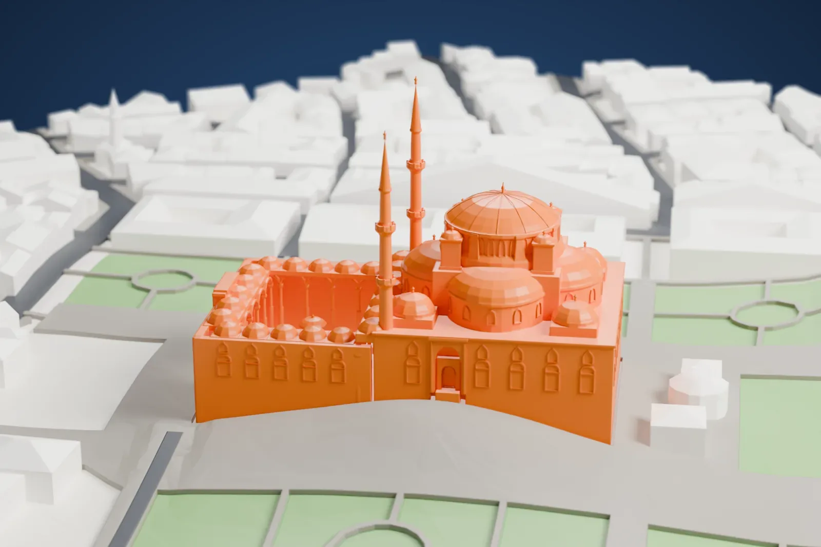 A white 3D print of the Fatih Mosque in Istanbul, shown among the surrounding streets and buildings.