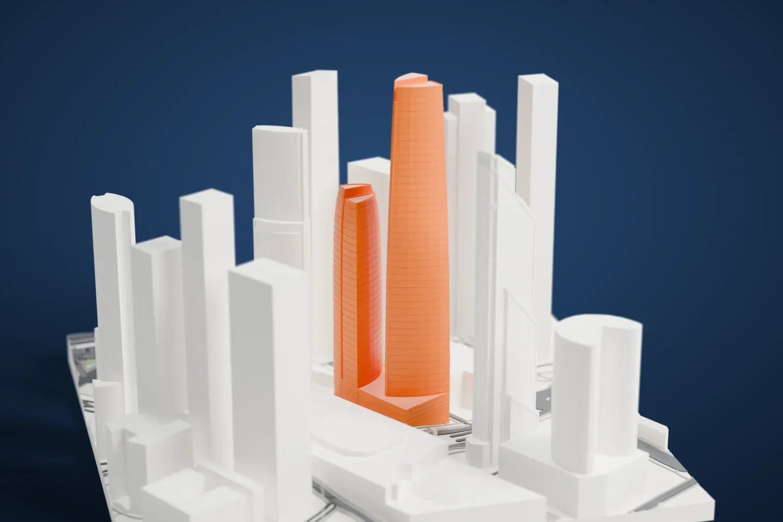 A white 3D print of Federation Tower, two slender skyscrapers rising from one wide podium among the surrounding buildings of the Moscow business district.