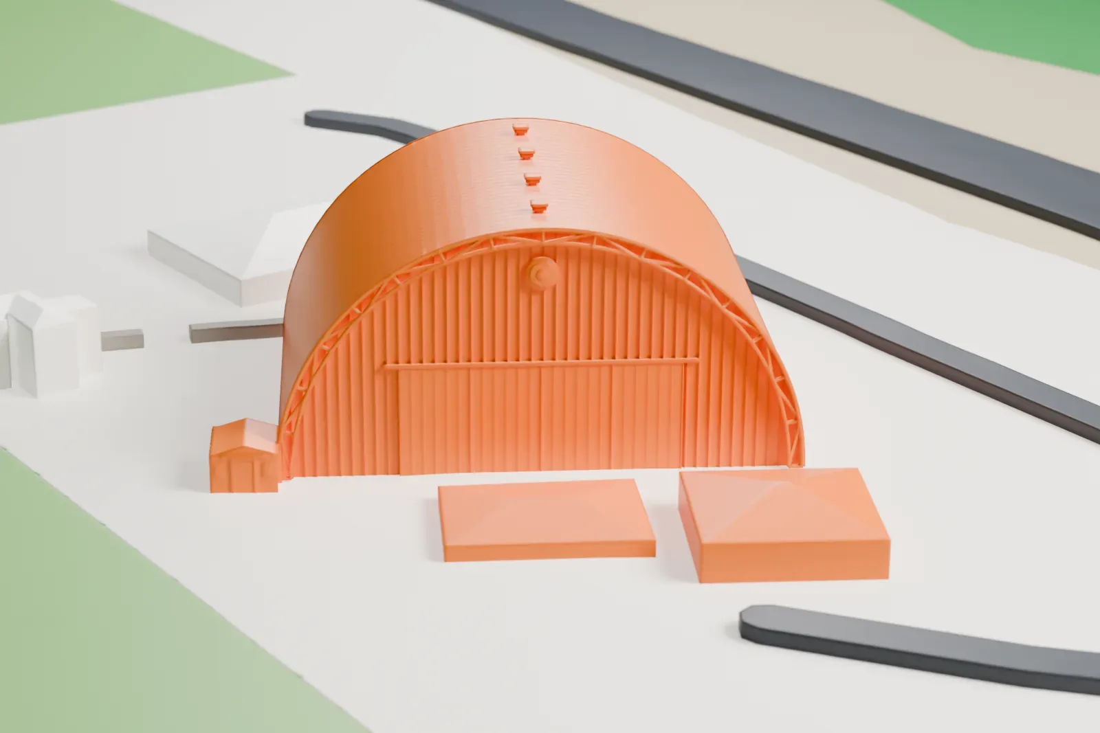 A white 3D print of the Fighter World hangar, a large arched barrel-vault hangar with tall doors, on open airfield ground with a few small buildings and roads.