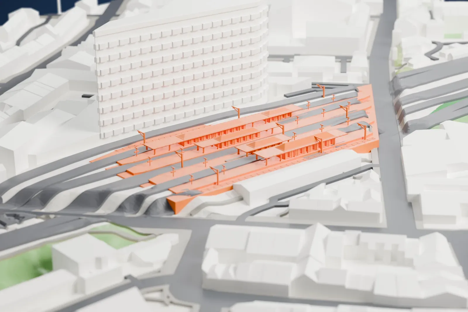 A white 3D print of Finsbury Park station in North London, set among the surrounding streets and buildings.