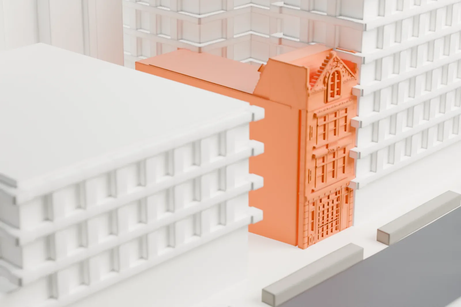 A white 3D print of Firehouse, Hook & Ladder Company 14, a narrow gabled building with a long low rear section, squeezed between much larger buildings.
